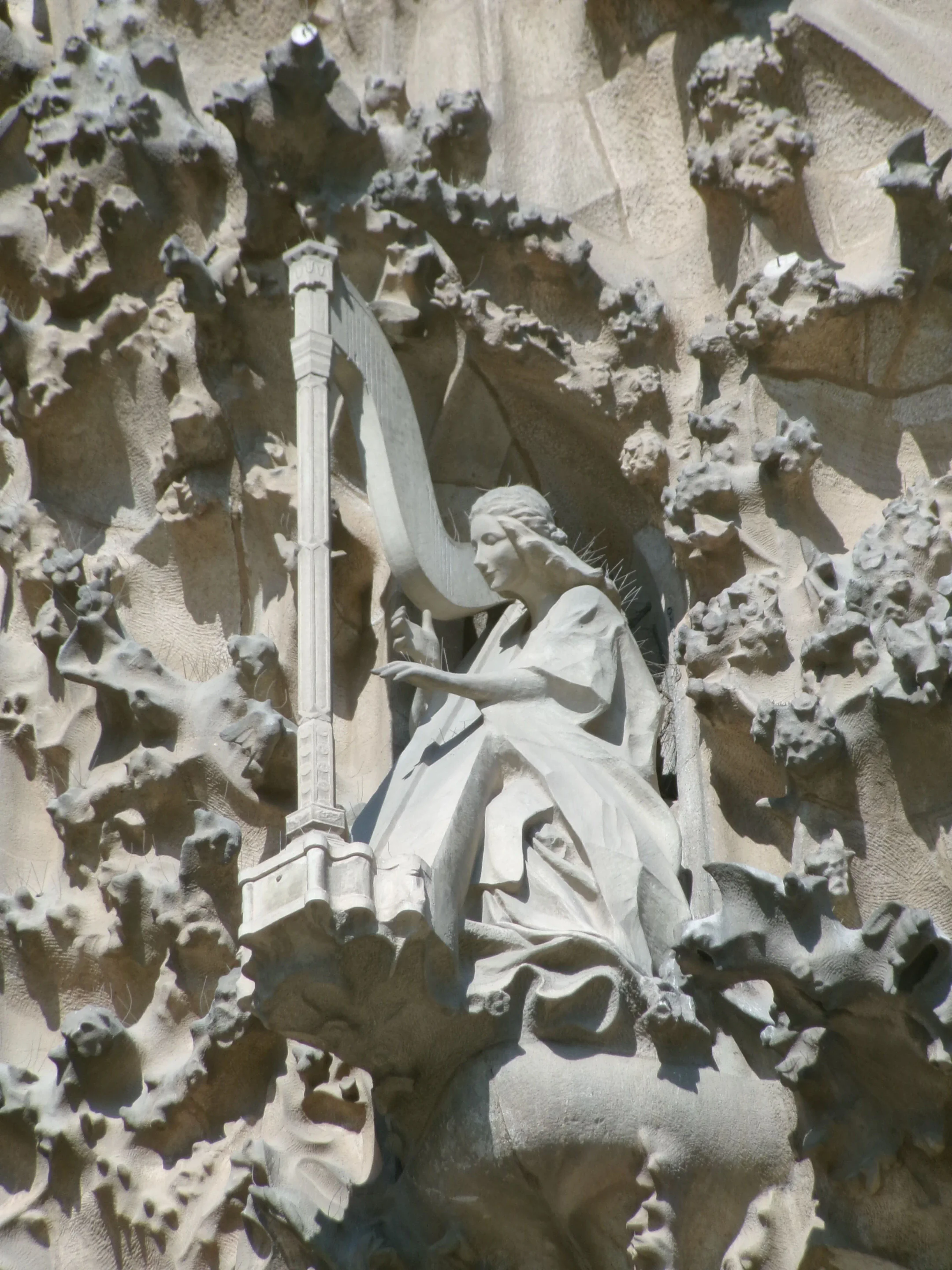 Angel playing a harp on the Nativity Facade of Sagrada Família